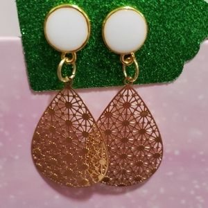 White stud earrings with gold filigree charms